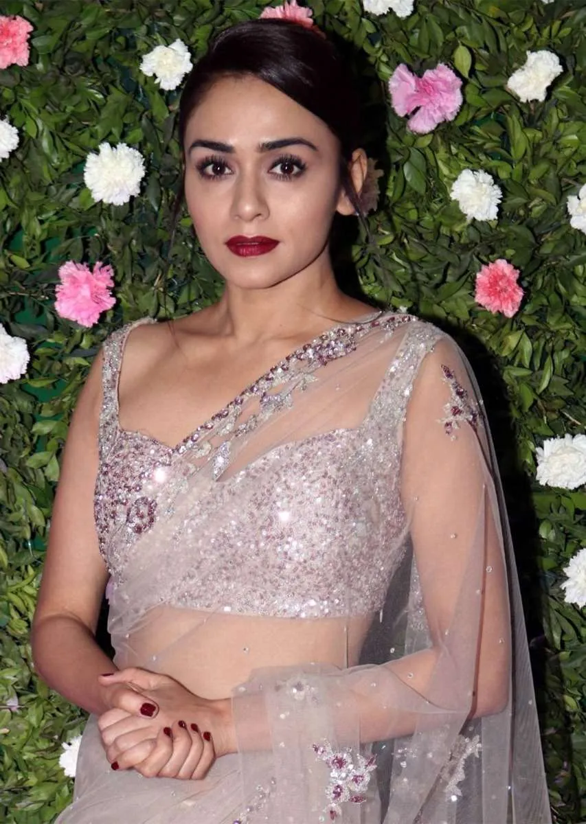 Amruta Khanvilkar in Kalki grey sheer net saree with floral embroidered butti